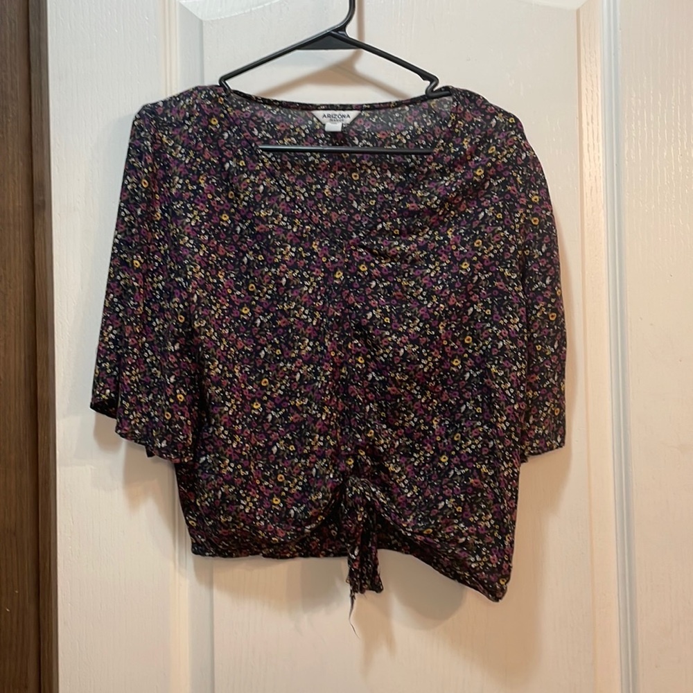 Medium size. From Arizona. Purple and Black. Knot at the bottom middle.